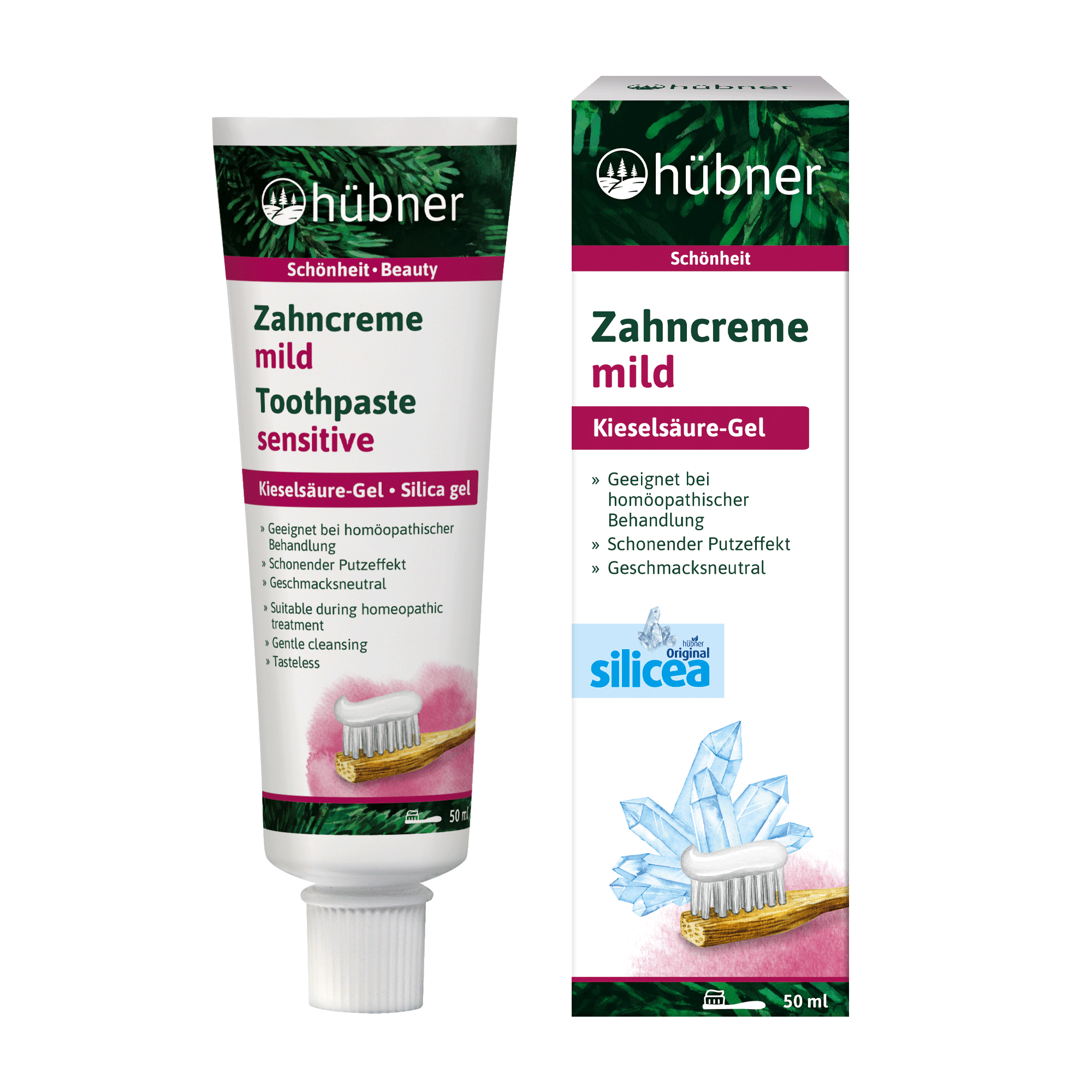 Eine Tube und eine Schachtel Hübner Zahncreme milde Zahnpasta Sensitive mit Kieselgel, mit einer Zahnbürste und einem Kristallbild auf der Verpackung.
